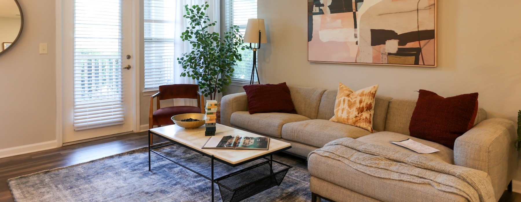 Luxury living room in one-bedroom apartments in Mooresville, NC at Legacy Lake Norman